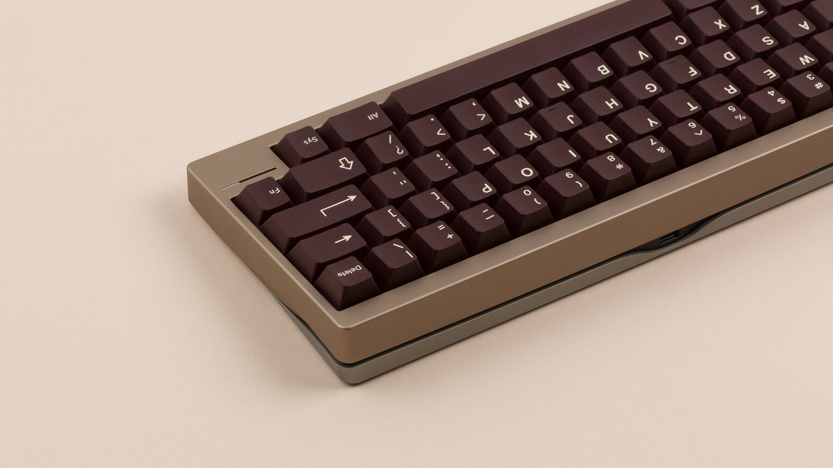  taupe lily back view right side featuring brown keycaps 