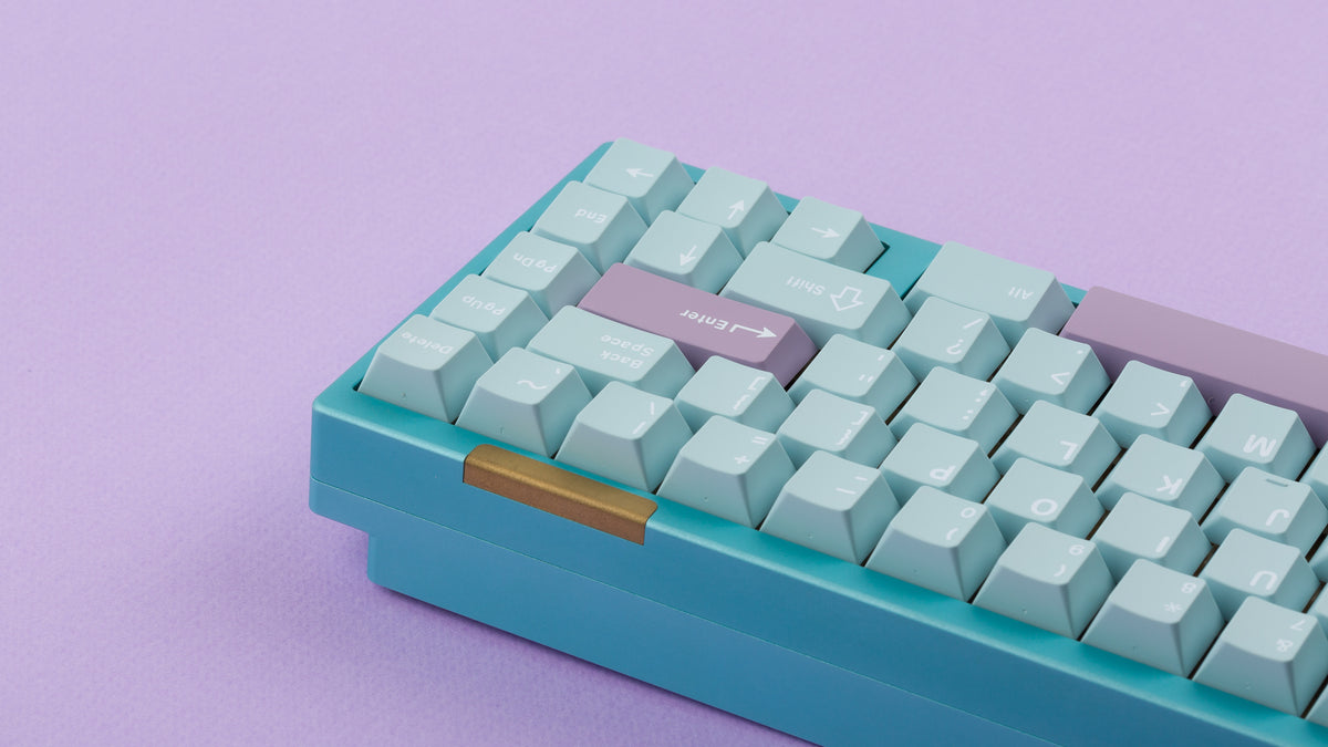  Key kobo Glacier on a blue keyboard back view right side 
