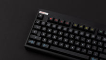 Load image into Gallery viewer, KAM Playground on a based black CLASSIC-TKL keyboard close up on left side angled