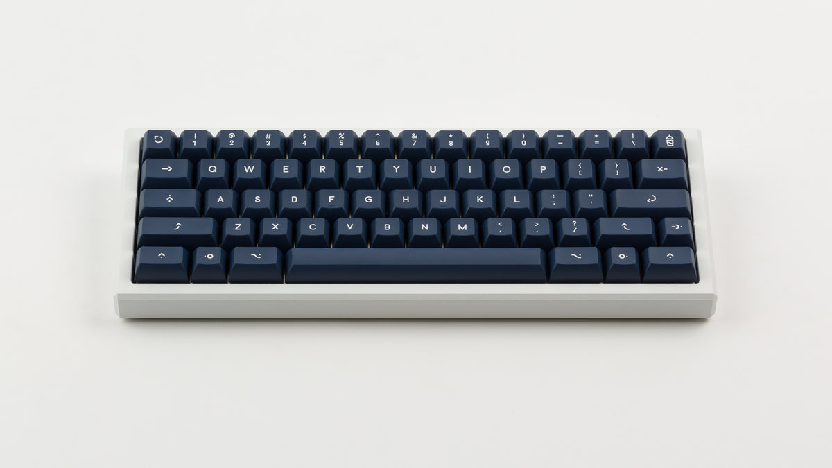  KAT Milkshake Dark Base Kit on a white keyboard 
