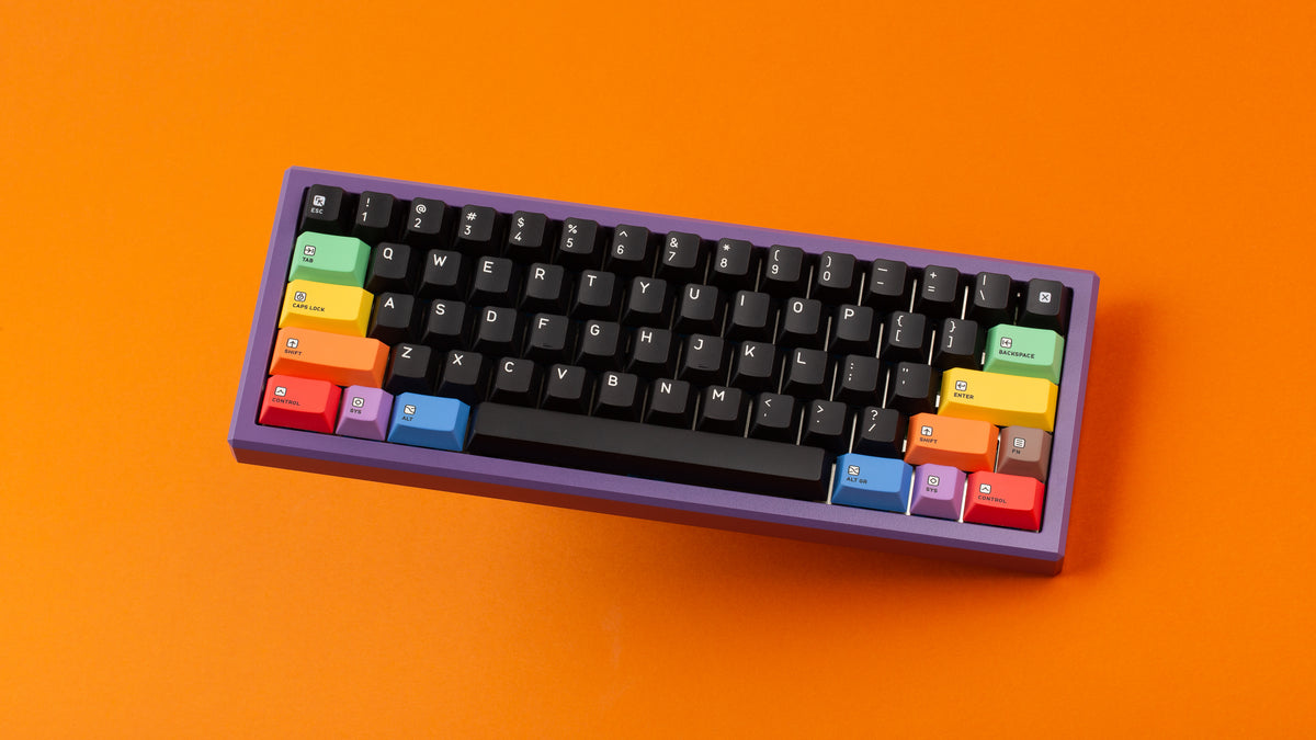  Keycapsule Prism dark on a purple keyboard angled 