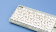Load image into Gallery viewer, Keycapsule Prism on a CLASSIC-GLO keyboard close up on left side angled