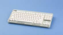 Load image into Gallery viewer, Keycapsule Prism on a CLASSIC-GLO keyboard angled