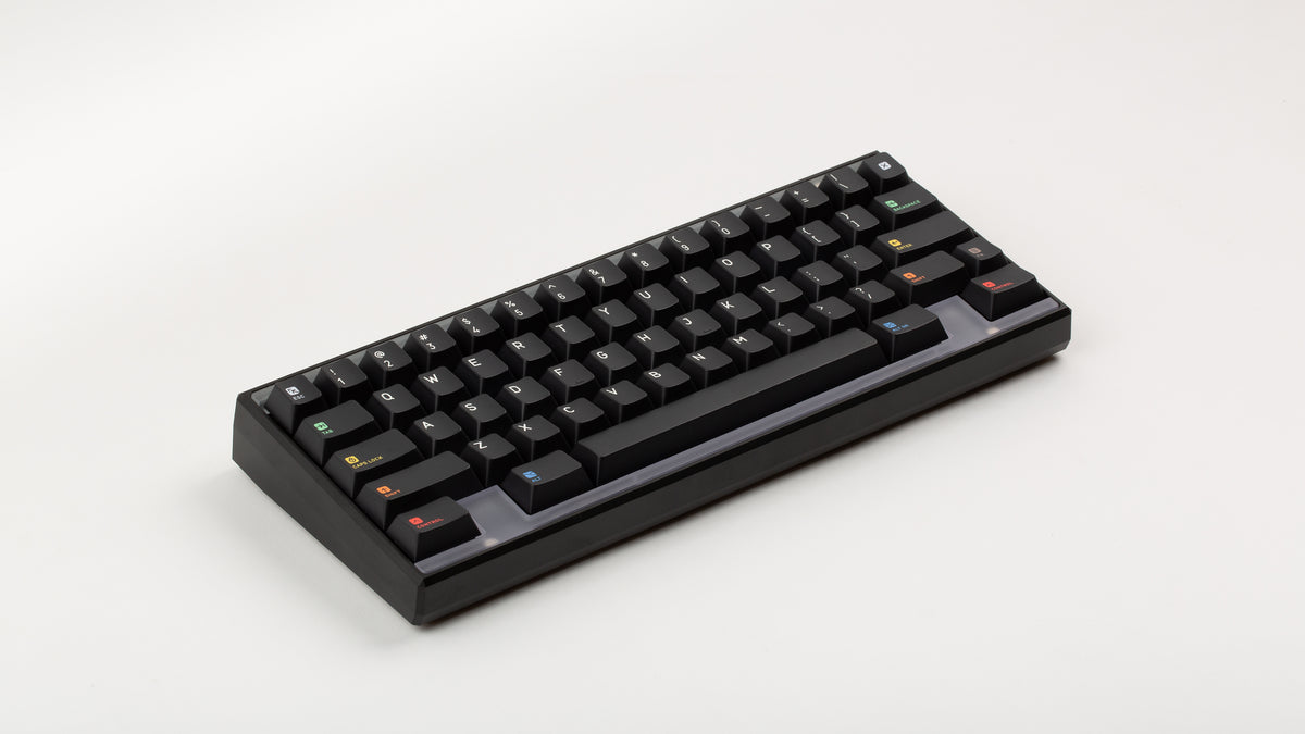  Keycapsule Prism dark on a black Keycult Zero with PC WKL accent bar angled 
