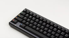 Load image into Gallery viewer, Keycapsule Prism on a black Keycult Zero with PC WKL Accent Layout Bars close up on left side