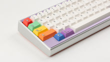 Load image into Gallery viewer, Keycapsule Prism on a Silver Keycult Zero with Lilac HHKB accent bar close up on left side