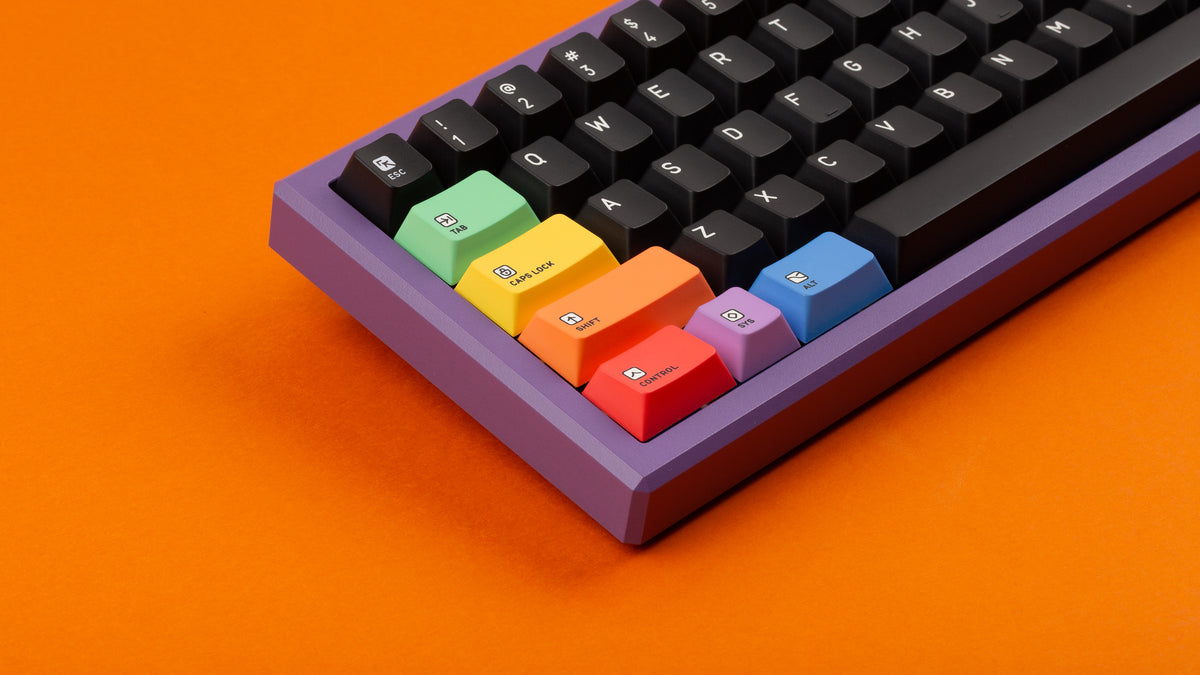 Keycapsule Prism dark on a purple keyboard close up on left side 