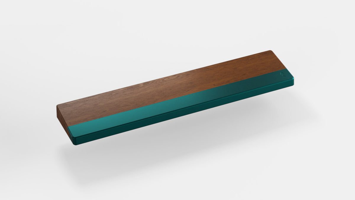  render of 65% walnut wrist rest with dark teal bar 