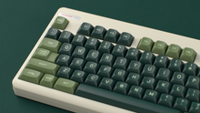 Load image into Gallery viewer, render of MTNU Skyriter on a retrobright beige CLASSIC-TKL close up on left side