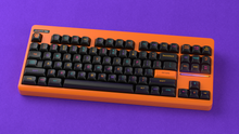 Load image into Gallery viewer, render of CLASSIC-TKL MICTLAN EDITION on a purple background angled