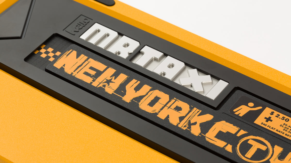 Matrix MRTAXI in NYC Sunflower Yellow close up on badge