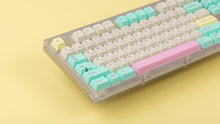 Load image into Gallery viewer, Keycult No. 1 / TKL Series 22 with keycaps on yellow background close up on left side