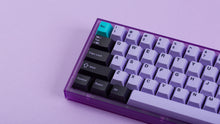 Load image into Gallery viewer, PBT Taro on a purple keyboard zoomed in left
