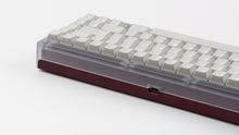 Load image into Gallery viewer, Keycult No. 2/65 with polycarbonate top and Purple Violet bottom with GMK CYL Modern materials keycaps back view close up on right side angled