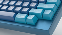 Load image into Gallery viewer, render of SA Macrodata Refinement on a blue Atom HHKB close up on right side