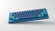 Load image into Gallery viewer, render of SA Macrodata Refinement on a blue Atom HHKB