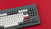 Load image into Gallery viewer, Smurve80 keyboard in Graphite right side angle on red surface