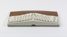 Load image into Gallery viewer, Powder coat beige Type-K back view with black walnut wrist rest featuring black on beige keycaps
