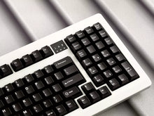 Load image into Gallery viewer, GMK CYL WoB black keycaps on silver keyboard, close-up of arrow key cluster