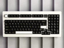 Load image into Gallery viewer, Render of GMK CYL WoB black keycaps with red accents on silver keyboard, top-down view