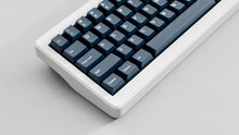 Load image into Gallery viewer, GMK CYL Blue Fabrik keycaps on silver keyboard, close-up of left side modifier keys