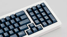 Load image into Gallery viewer, GMK CYL Blue Fabrik keycaps on silver keyboard, close-up of numpad section