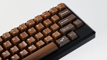 Load image into Gallery viewer, Render of GMK CYL Chocolatier keycaps on a keyboard, close-up of the right side showing numrow and navigation area