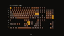 Load image into Gallery viewer, Render of GMK CYL Chocolatier Base Kit showing full keycap layout with chocolate brown alphas, dark brown modifiers, and golden yellow accent keys