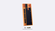 Load image into Gallery viewer, MONOKEI Standard - Yuji Edition at a vertical angle featuring dark purple and orange double shot PBT Series 1 keycaps