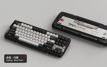 Load image into Gallery viewer, Render of Matrix Carnival keyboard in Coated Black Flash, showing front with keycaps and back with decorative weight
