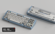 Load image into Gallery viewer, Render of Matrix Carnival keyboard in Coated Light Blue, showing front with keycaps and back with decorative weight