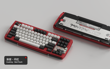 Load image into Gallery viewer, Render of Matrix Carnival keyboard in Coated Red Flash, showing front with keycaps and back with decorative weight