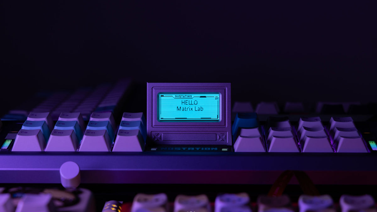  Matrix NOSTATION with purple lighting focused on the screen displaying HELLO Matrix Lab 