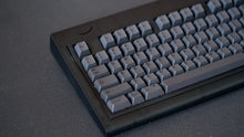 Load image into Gallery viewer, Smurve80 Last Night 7u angled view with gray PBT keycaps