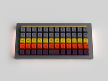 Load image into Gallery viewer, SA Recall on a gray and gold keyboard centered