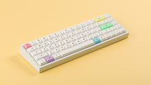Load image into Gallery viewer, DSA Milkshake on a white keyboard angled