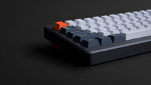 Load image into Gallery viewer, GMK CYL Grand Prix on a blue keyboard zoomed in on left front