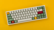 Load image into Gallery viewer, GMK CYL Boba Fett on a white keyboard angled