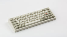 Load image into Gallery viewer, GMK CYL Classic Retro Zhuyin on a beige NK65 angled