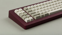 Load image into Gallery viewer, GMK CYL Classic Retro Zhuyin on a maroon NK+ zoomed in on left