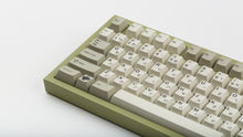 Load image into Gallery viewer, GMK CYL Classic Retro Zhuyin on a green NK87 zoomed in on left
