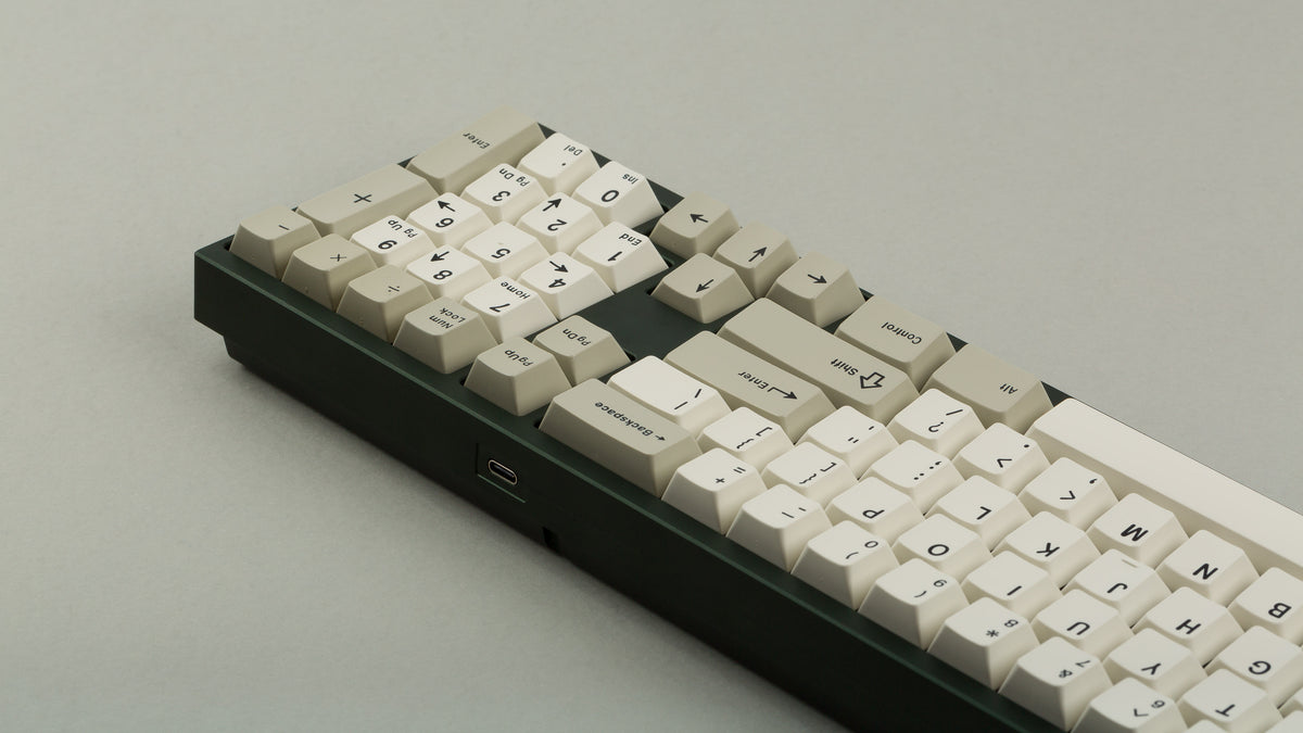  GMK CYL Hineybeige on a green keyboard back view 