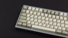 Load image into Gallery viewer, GMK CYL Hineybeige on a silver 7V keyboard close up on left