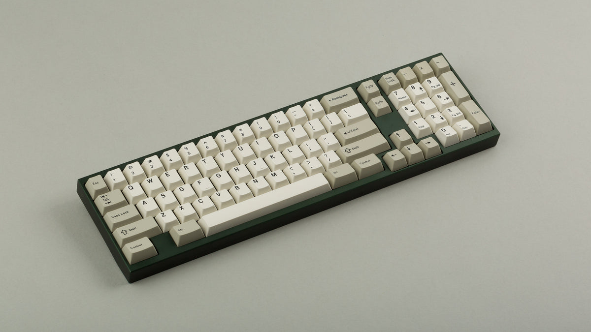  GMK CYL Hineybeige on a green keyboard angled 