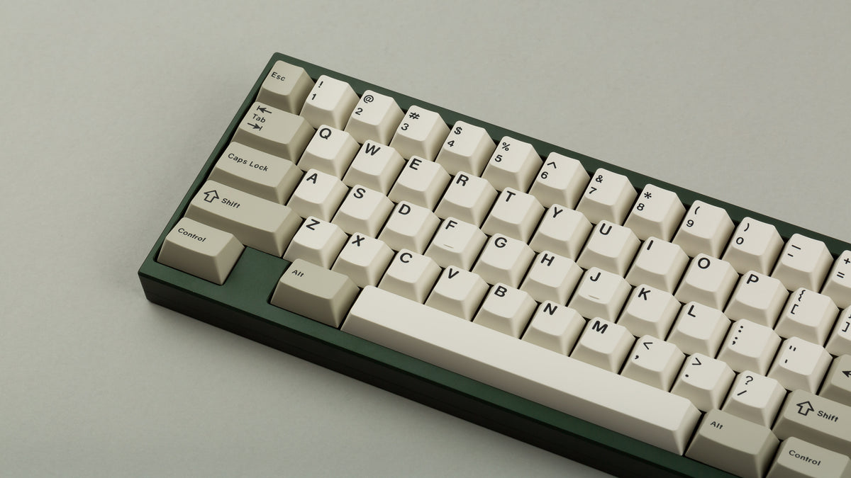  GMK CYL Hineybeige on a green keyboard close up on left 