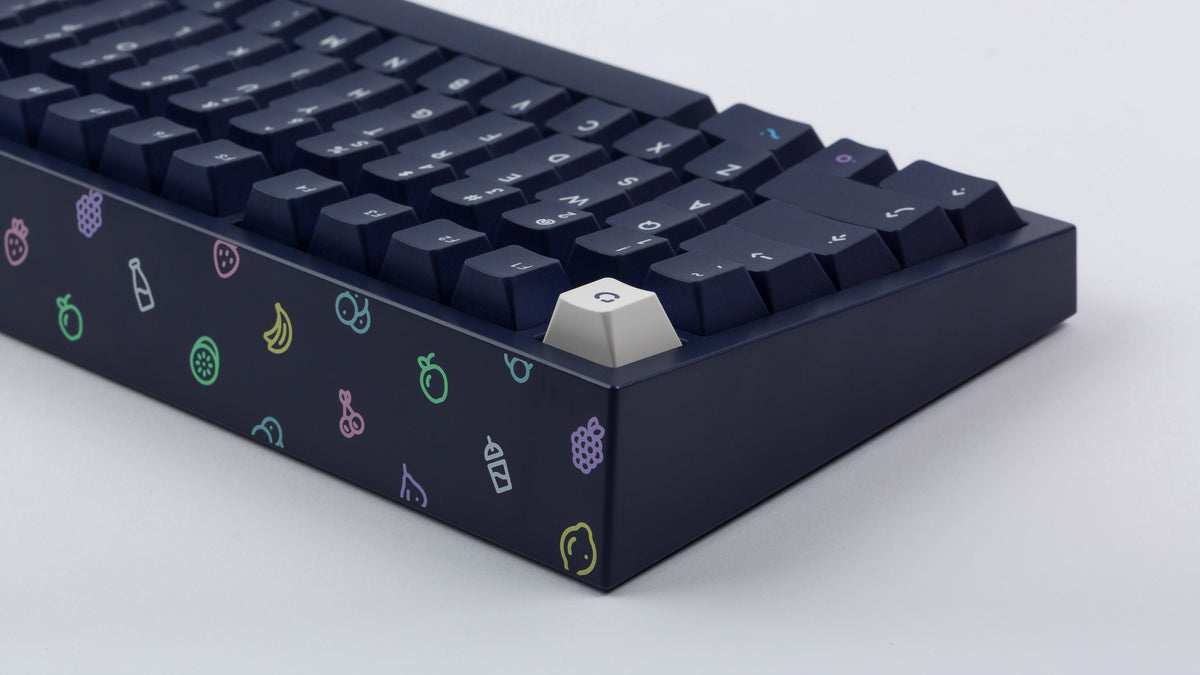  dark blue NK87 case with included dark milkshake themed keycaps  close up of back view 