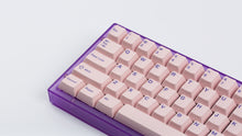 Load image into Gallery viewer, Cherry Blossom on a purple keyboard zoomed in left