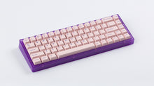 Load image into Gallery viewer, Cherry Blossom on a purple keyboard angled