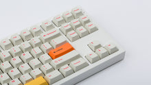 Load image into Gallery viewer, Cherry Ember on a white NK87 keyboard zoomed in right