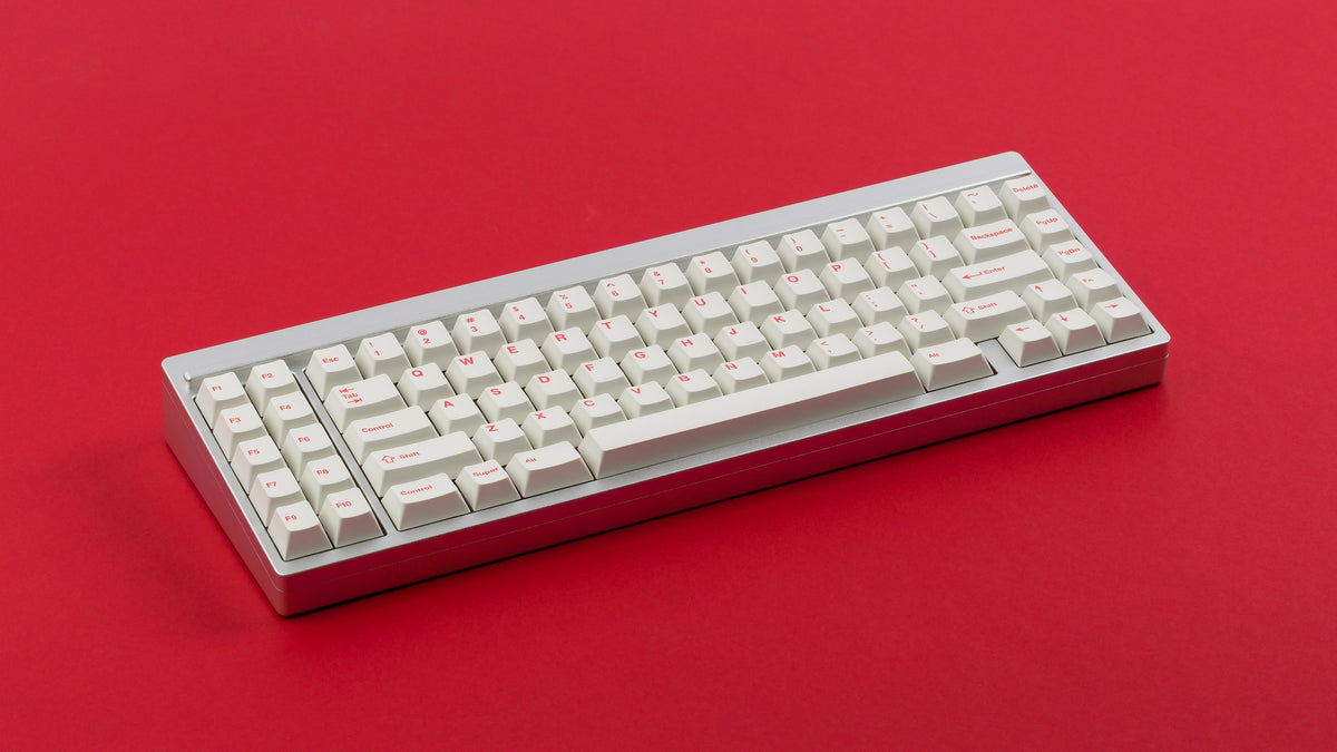  Cherry Ember on a silver keyboard angled 